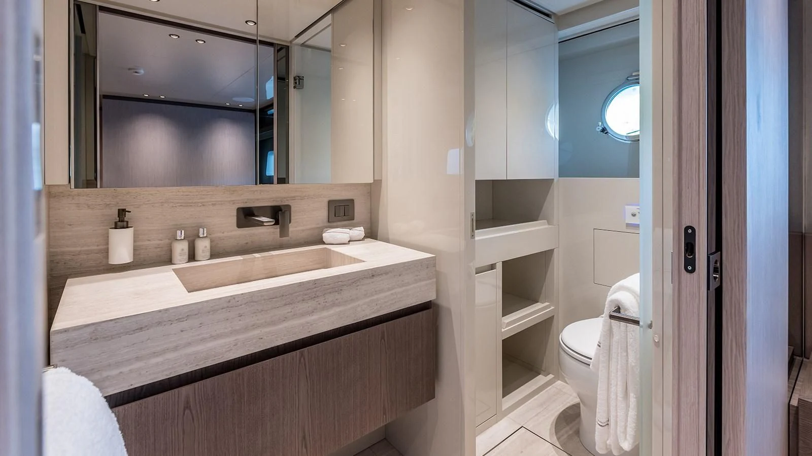 a bathroom with a sink and a mirror aboard EROS Yacht for Sale