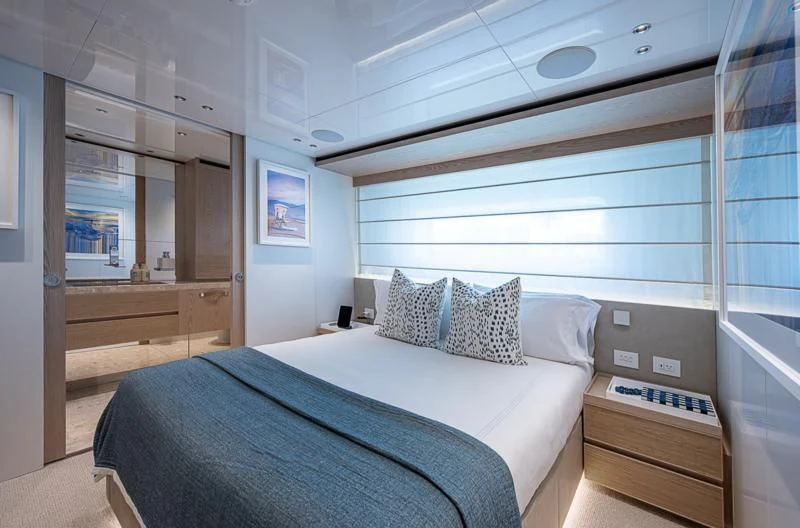 a bed in a room aboard EROS Yacht for Sale