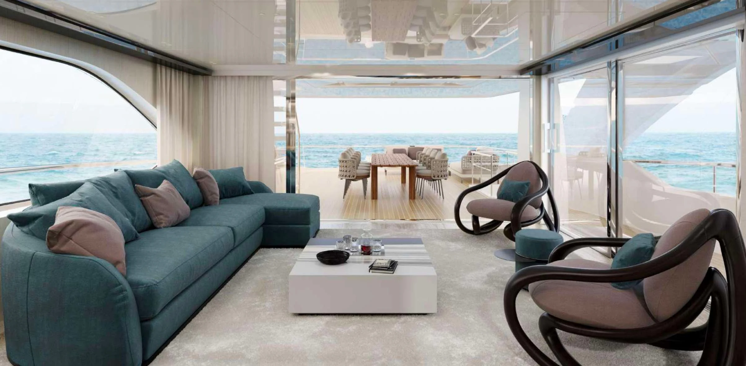 a living room with a couch and a table aboard EROS Yacht for Sale