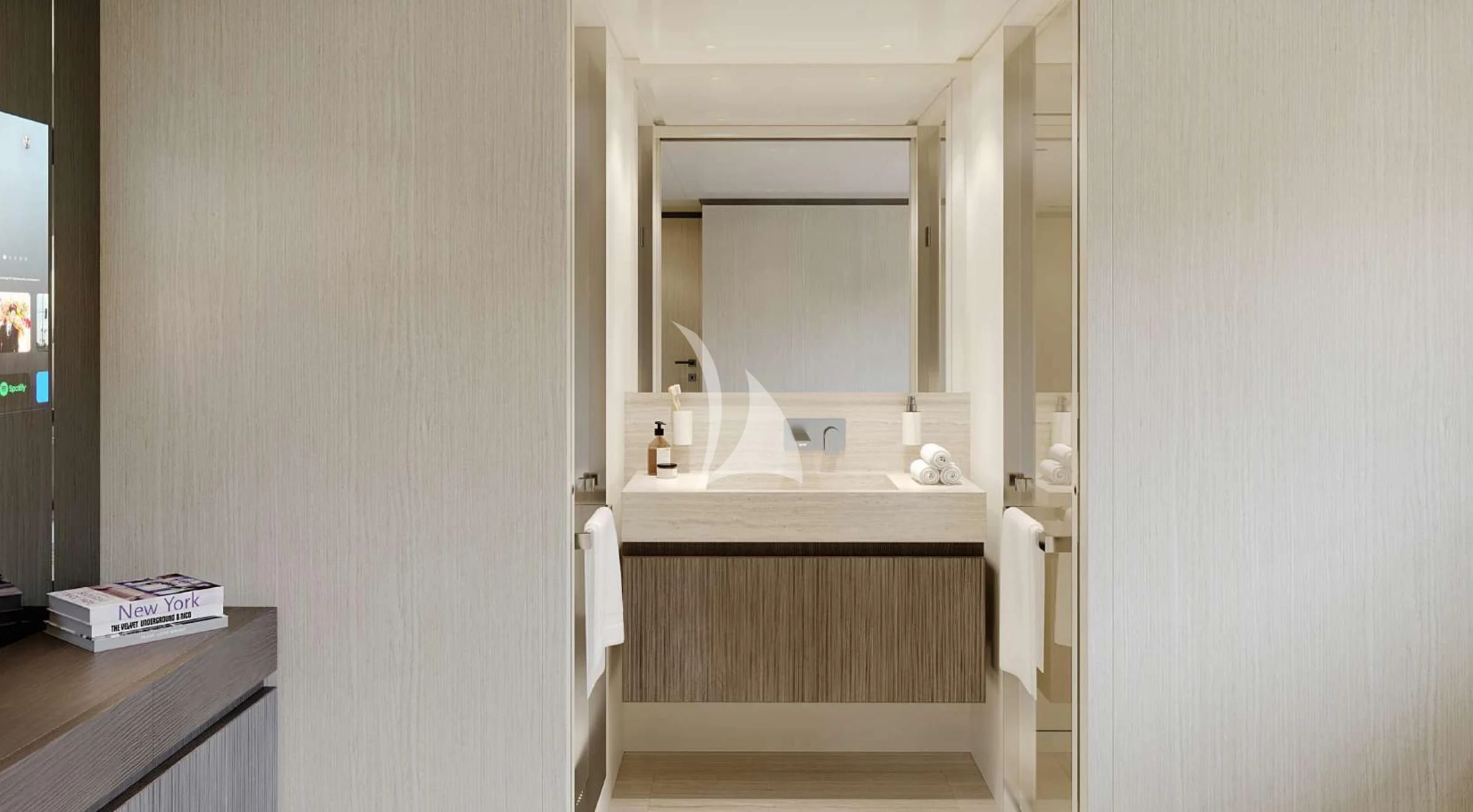 a bathroom with a mirror and a sink aboard EROS Yacht for Sale