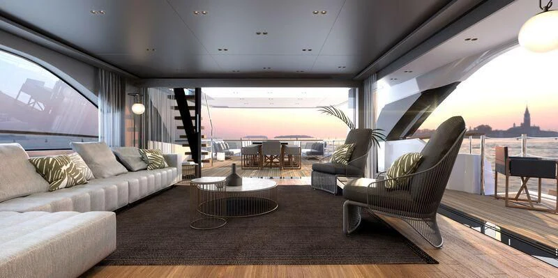 a living room with a couch and a table aboard EROS Yacht for Sale