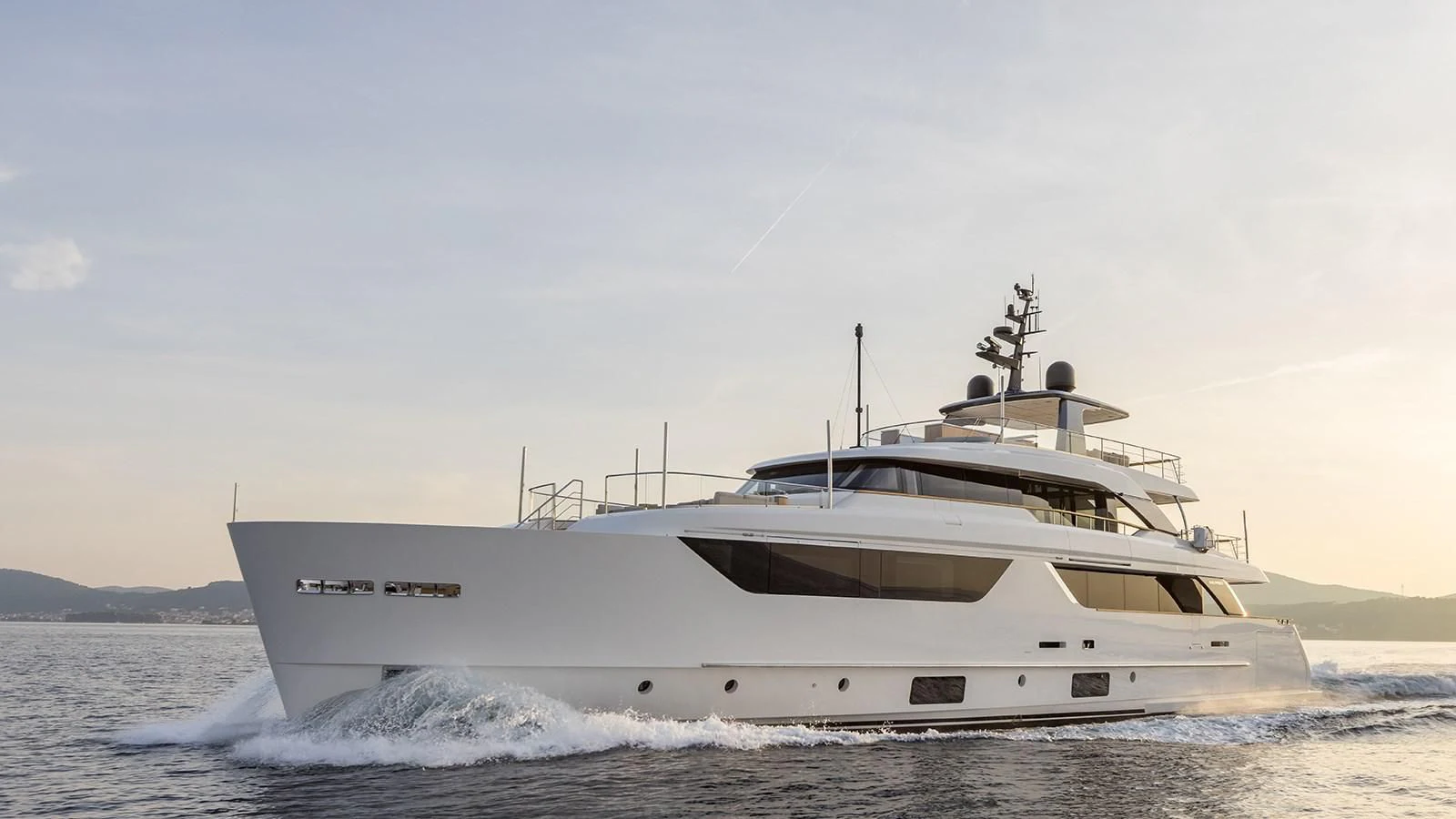 a white boat on the water aboard EROS Yacht for Sale