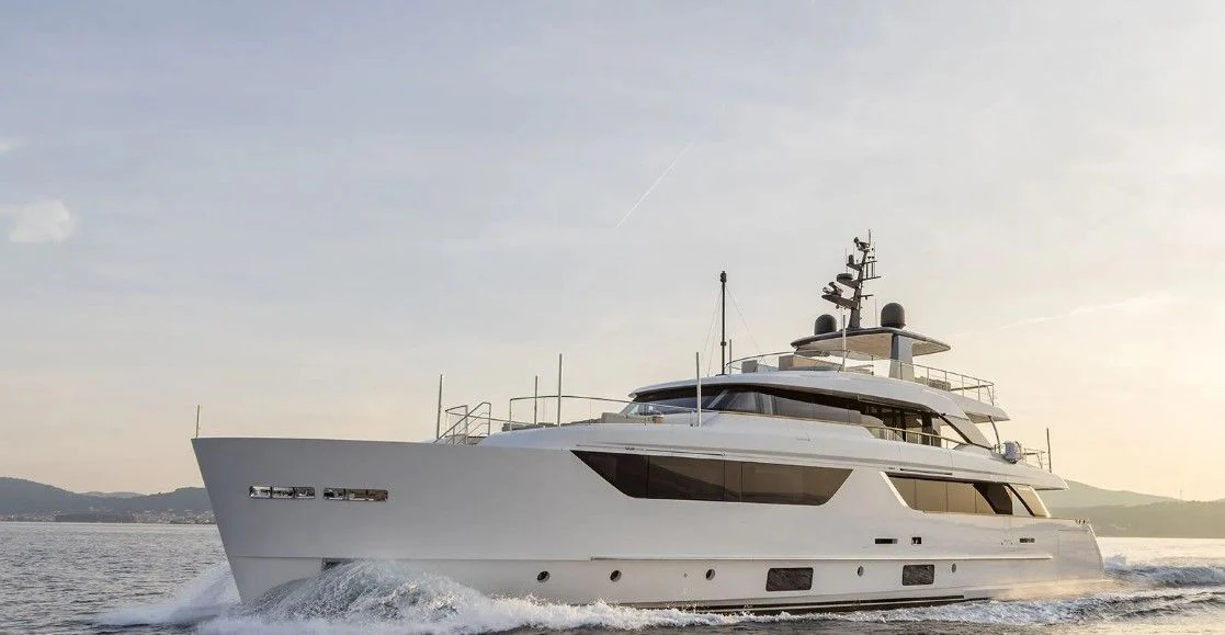 a white yacht in the water aboard EROS Yacht for Sale