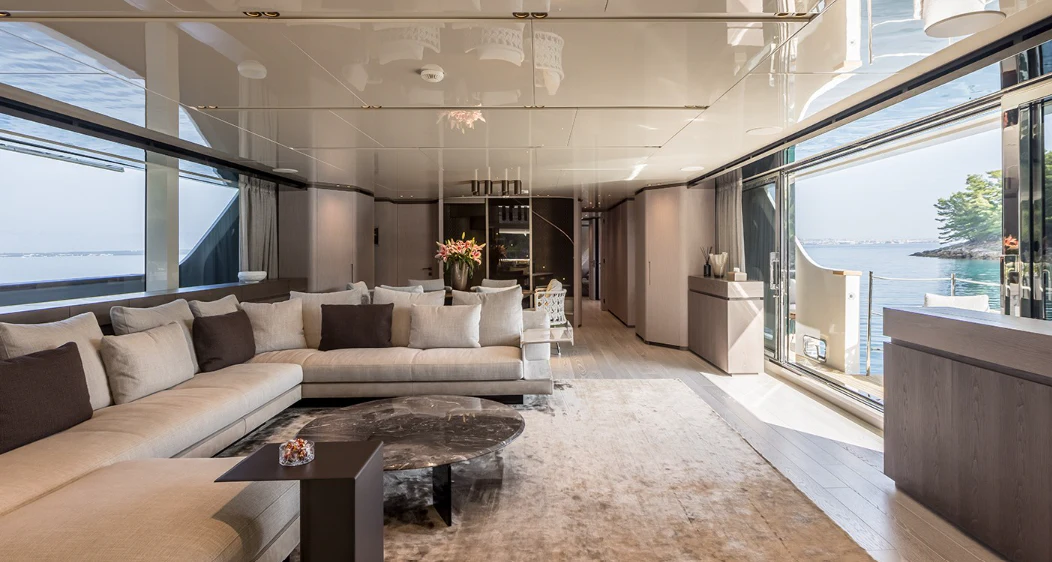 a living room with a large window aboard EROS Yacht for Sale
