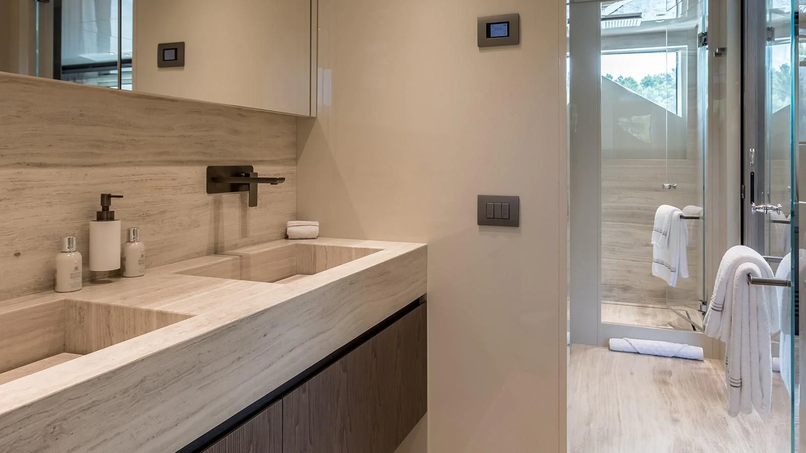 a bathroom with a sink and a mirror aboard EROS Yacht for Sale