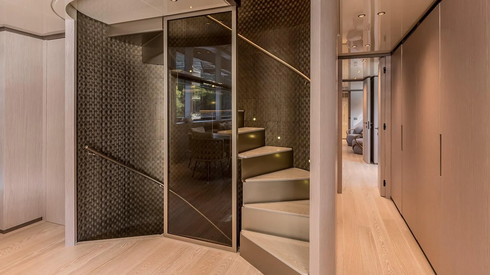 a hallway with a glass door aboard EROS Yacht for Sale