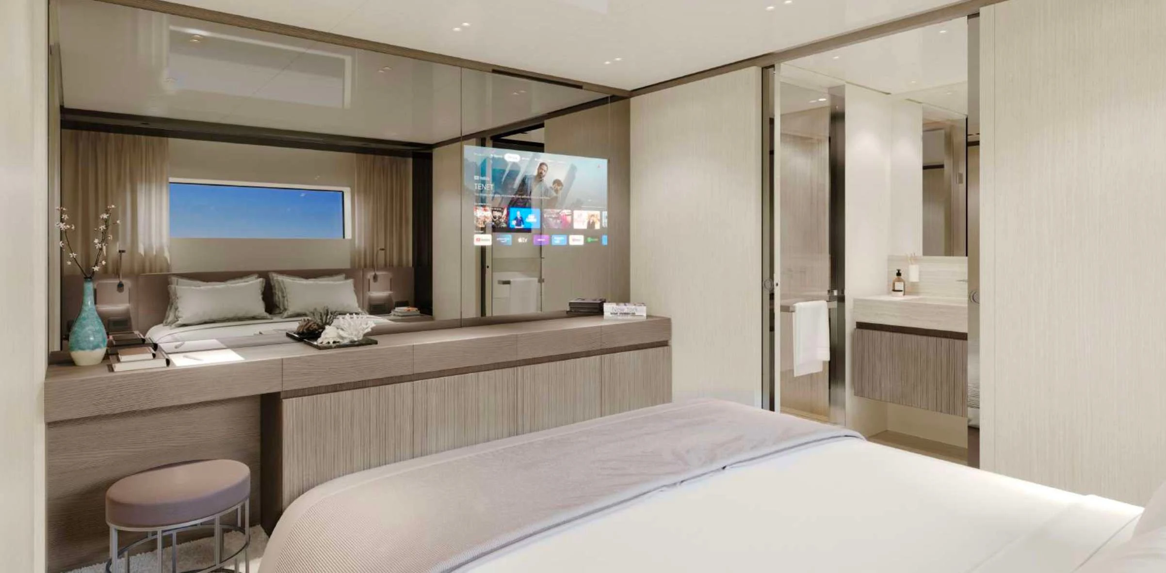 a hotel room with a bed and a tv aboard EROS Yacht for Sale