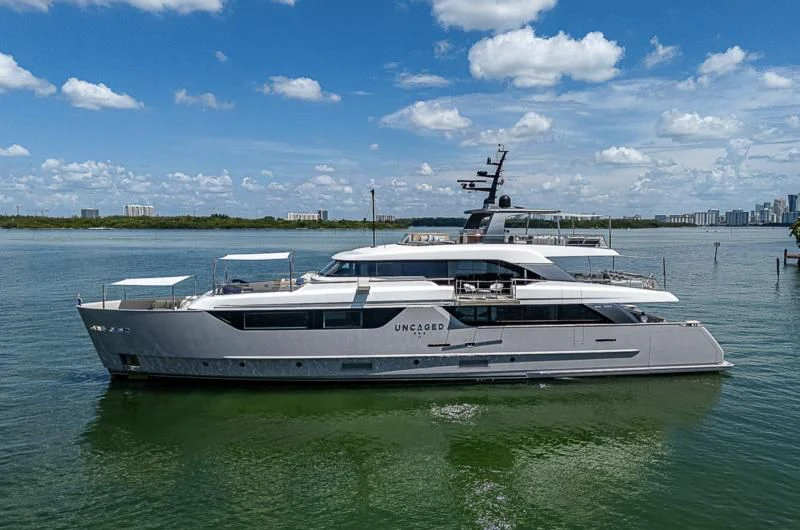 a white yacht in the water aboard EROS Yacht for Sale