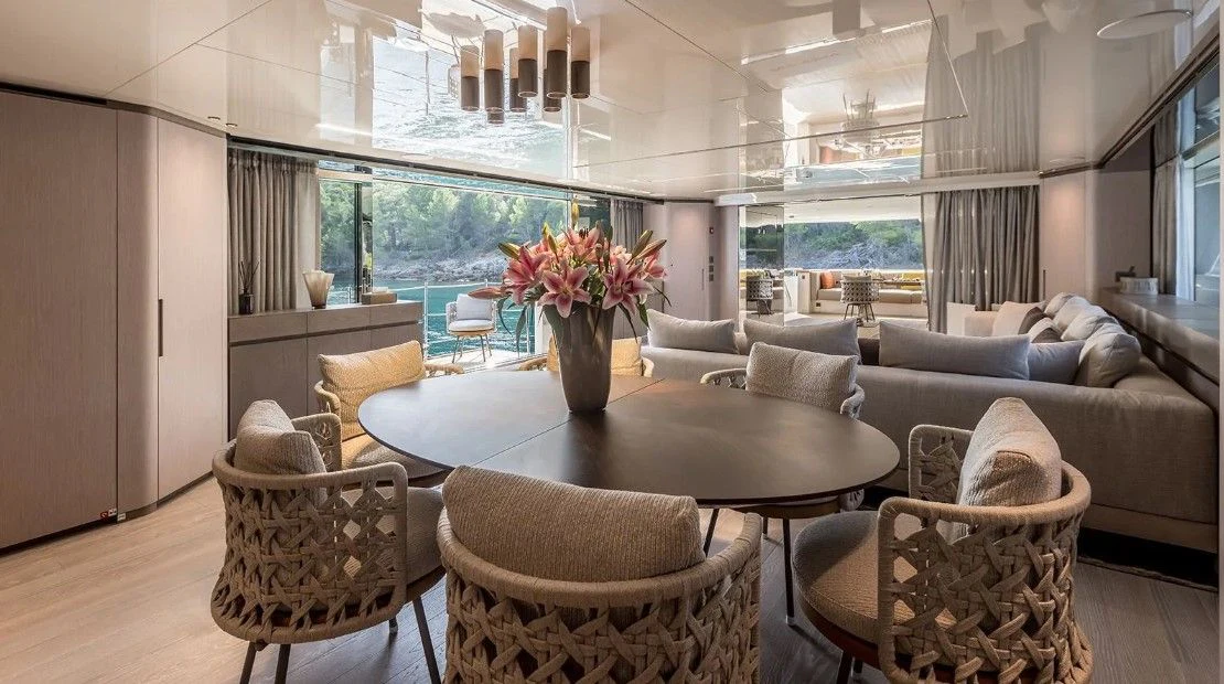 a living room with a large window aboard EROS Yacht for Sale