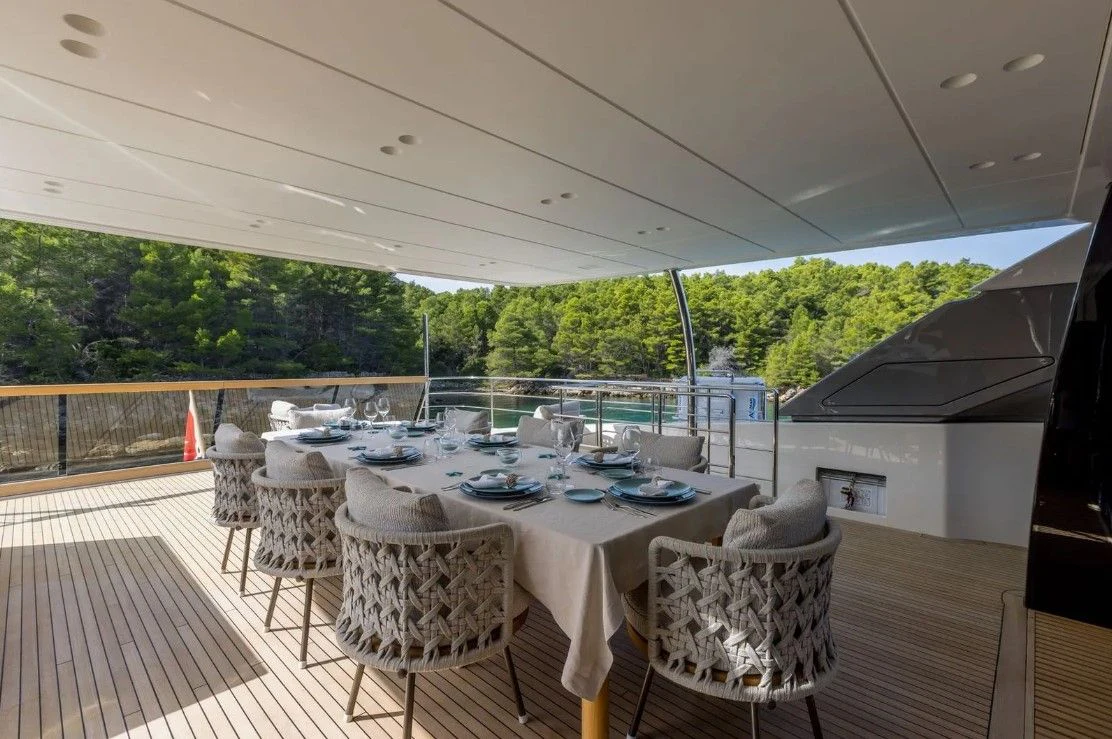 a table set for a meal aboard EROS Yacht for Sale