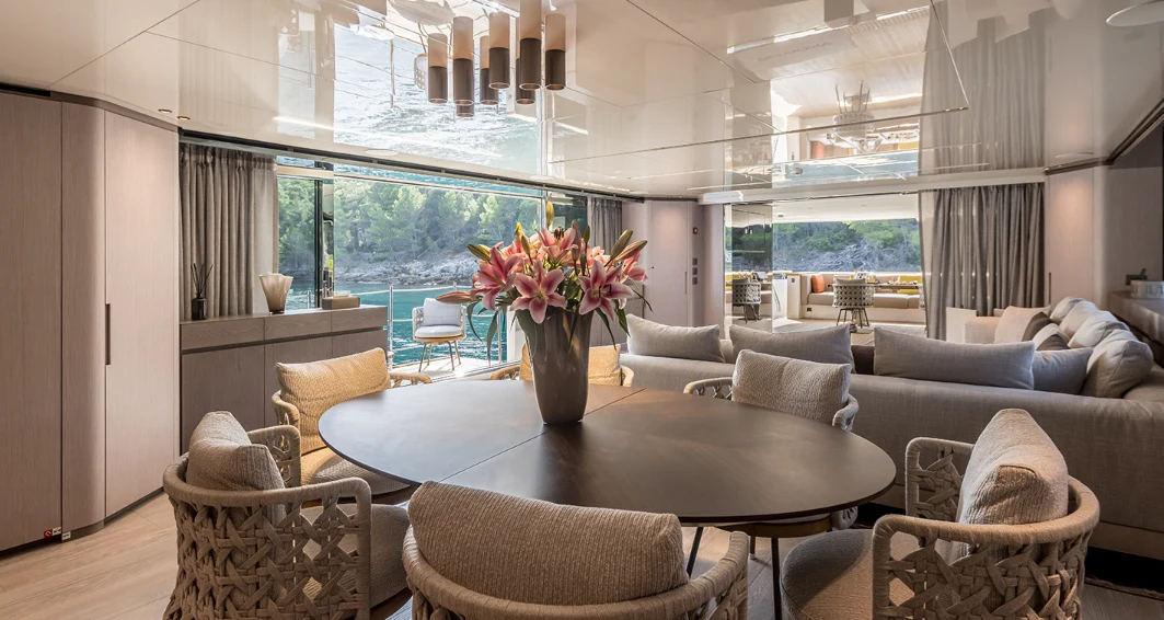 a living room with a large window aboard EROS Yacht for Sale