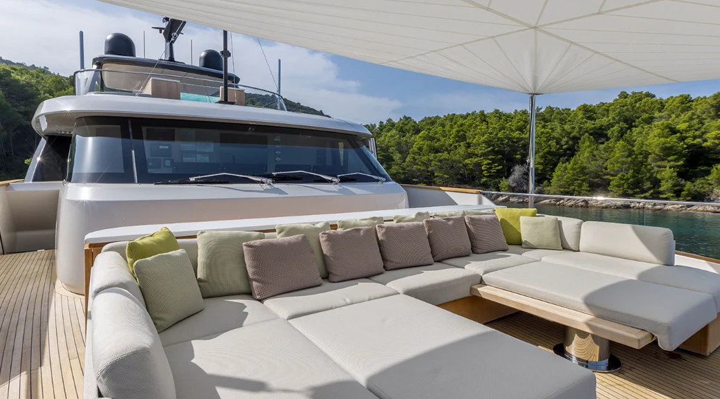 a white car on a boat aboard EROS Yacht for Sale