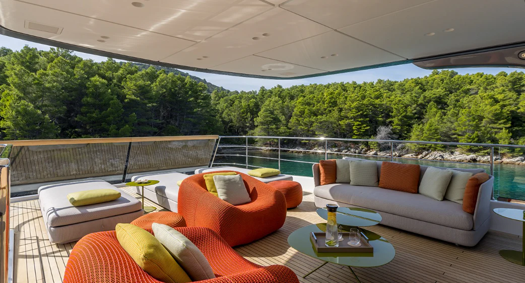 a living room with a large window aboard EROS Yacht for Sale