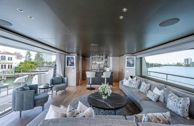 a living room with a large window aboard EROS Yacht for Sale