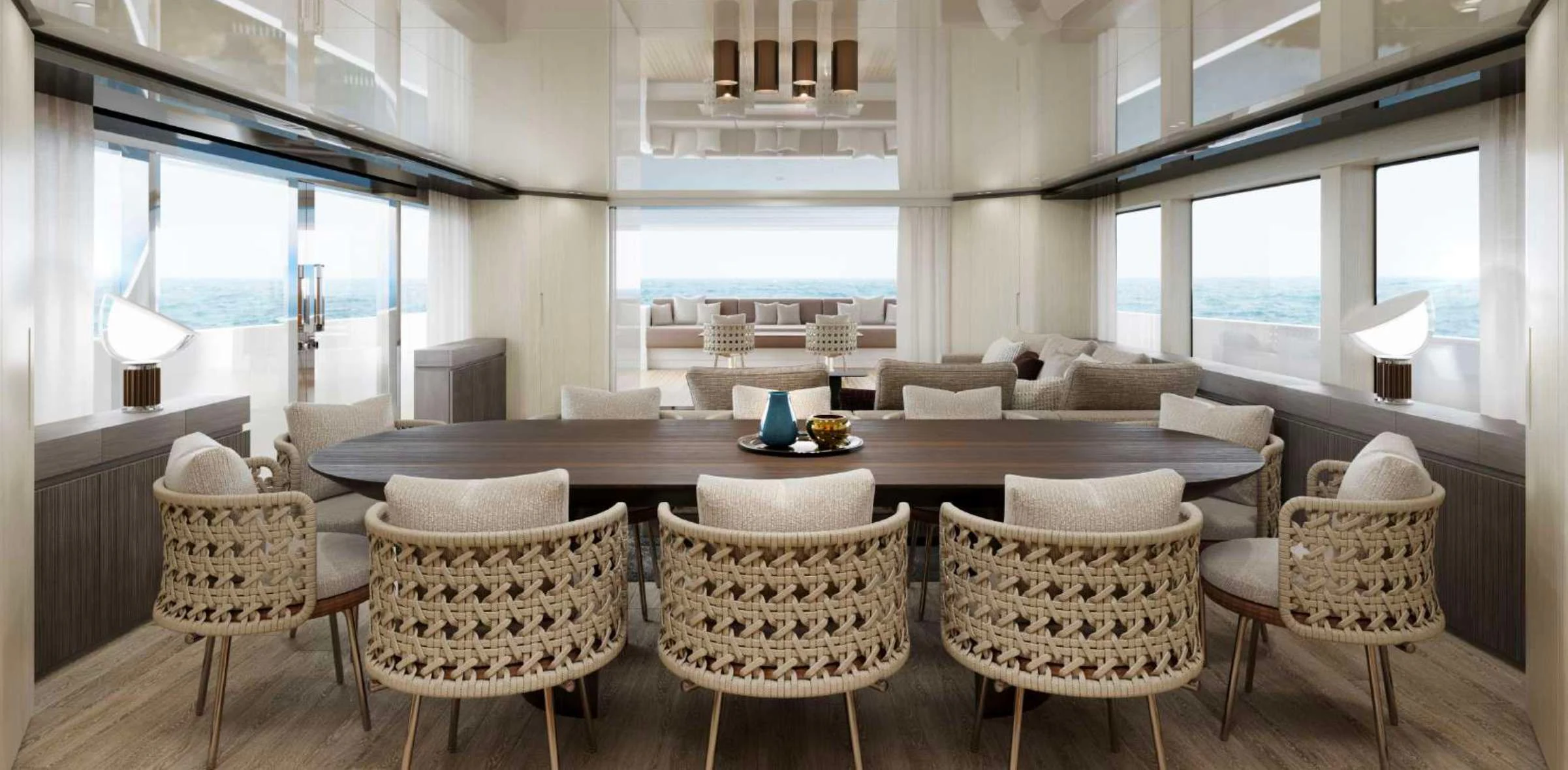 a room with a couch and chairs aboard EROS Yacht for Sale