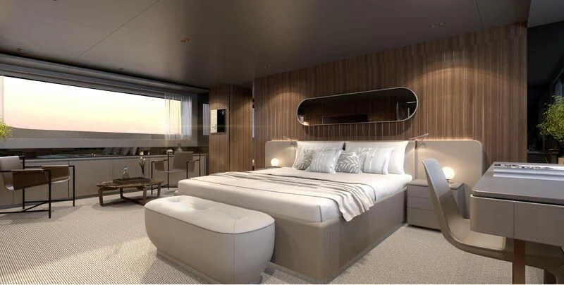 a room with a bed and a chair aboard EROS Yacht for Sale