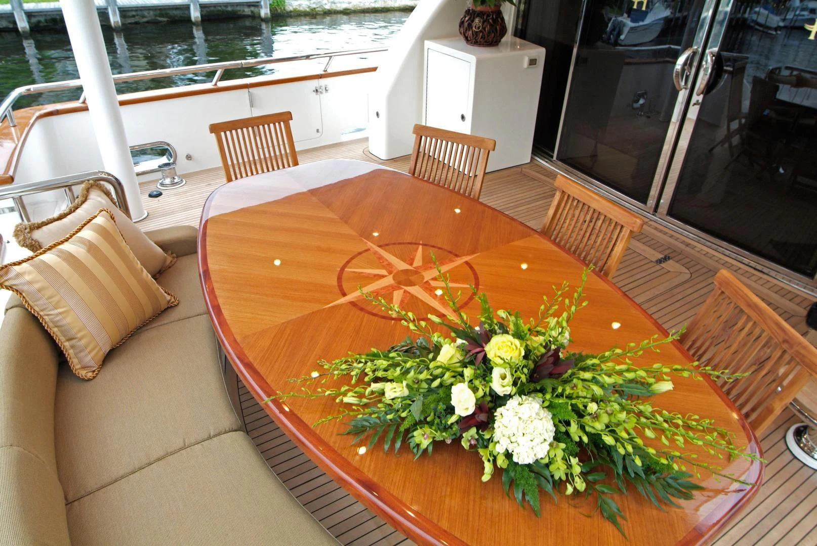 a planter box on a couch aboard AUSTRALIS Yacht for Sale