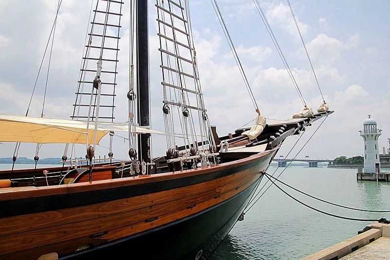 a boat tied to a dock aboard DUNIA BARU Yacht for Charter