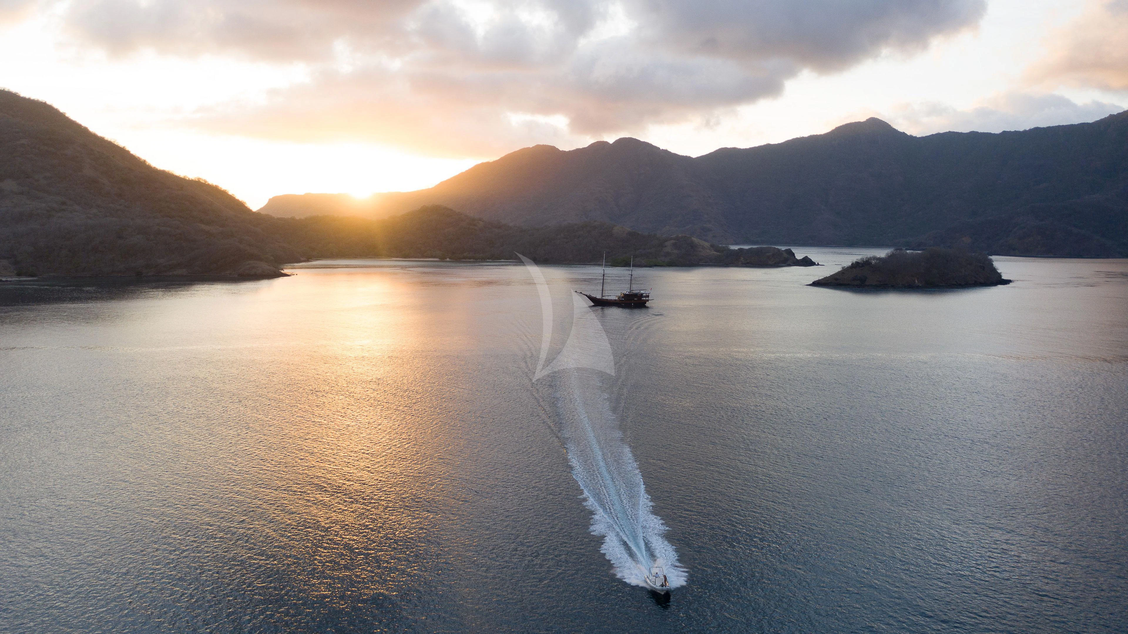 a boat on the water aboard DUNIA BARU Yacht for Charter