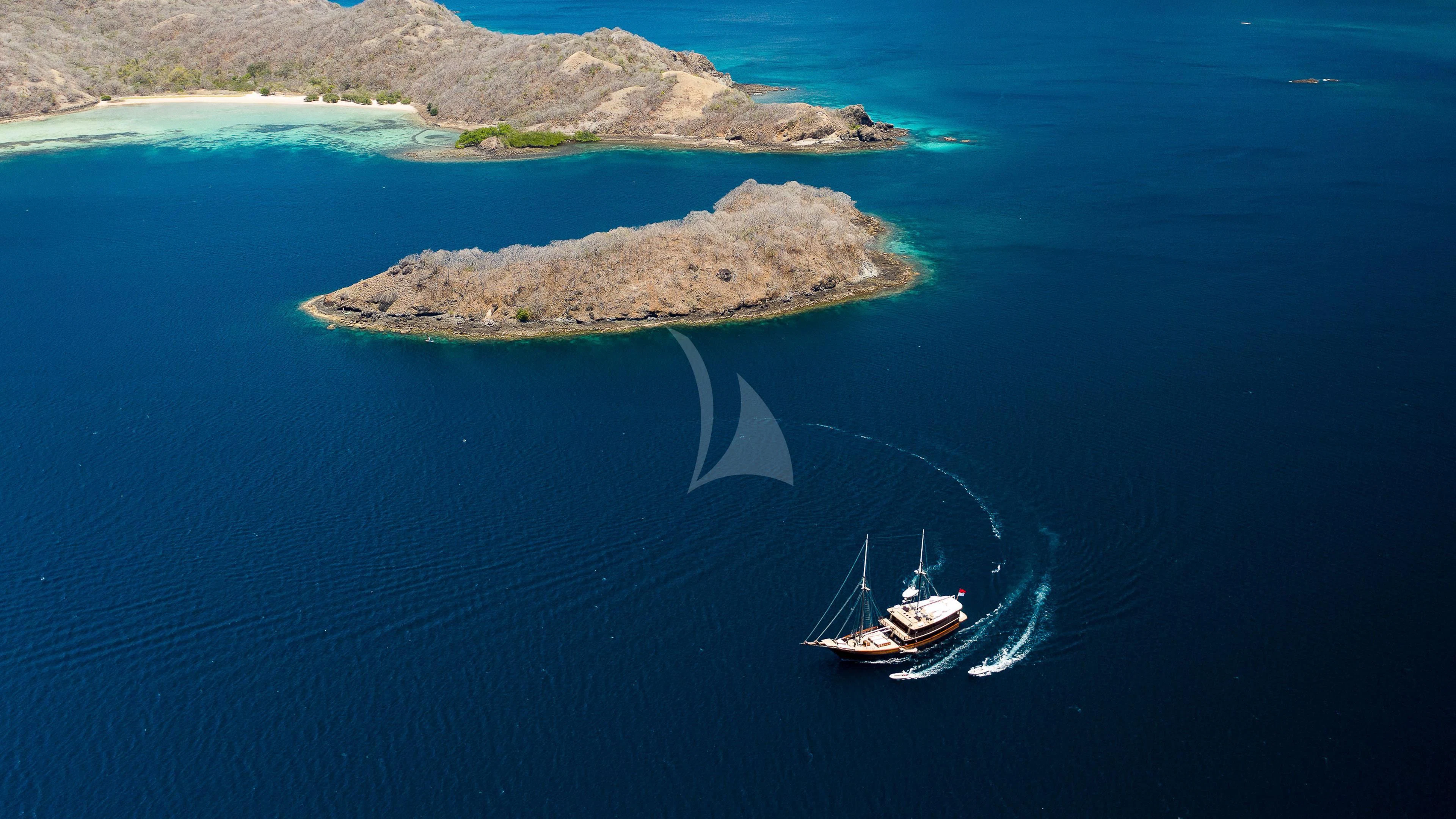 a boat in the water aboard DUNIA BARU Yacht for Charter