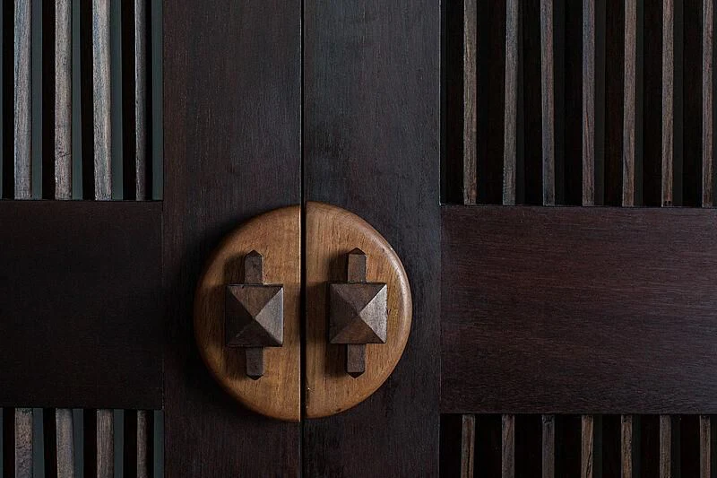 a wooden door with a lock aboard DUNIA BARU Yacht for Charter