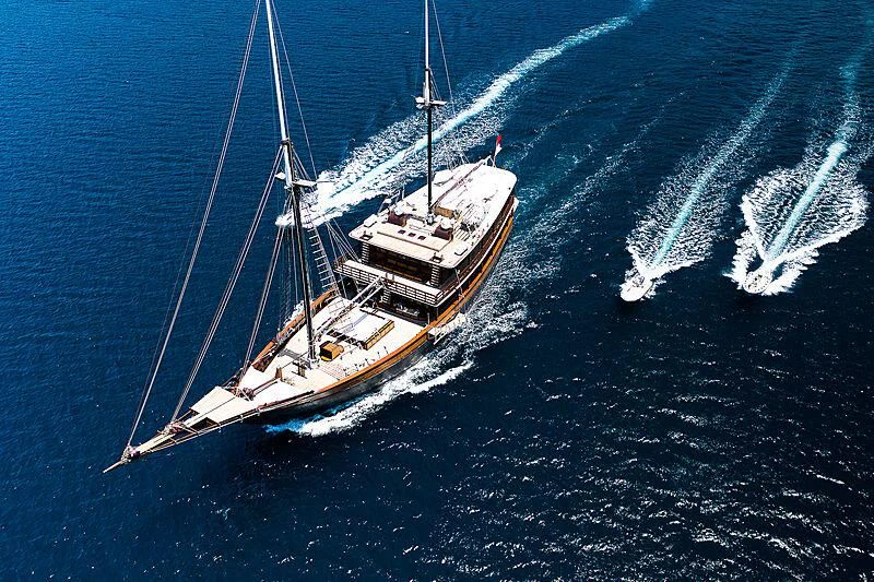 a boat sailing on the sea aboard DUNIA BARU Yacht for Charter