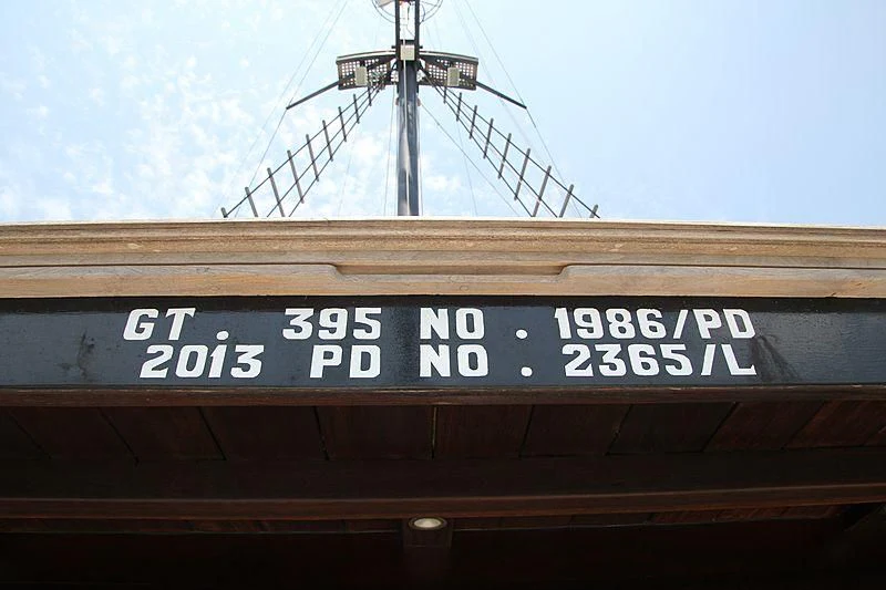 a sign on a building aboard DUNIA BARU Yacht for Charter