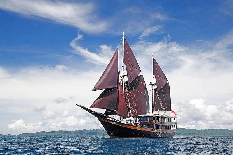 a boat in the water aboard DUNIA BARU Yacht for Charter