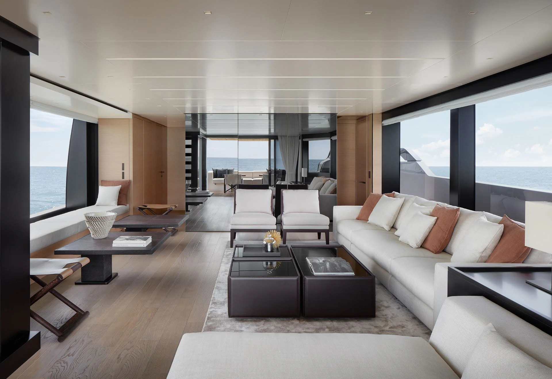 a living room with a large window aboard STRA DODO Yacht for Sale