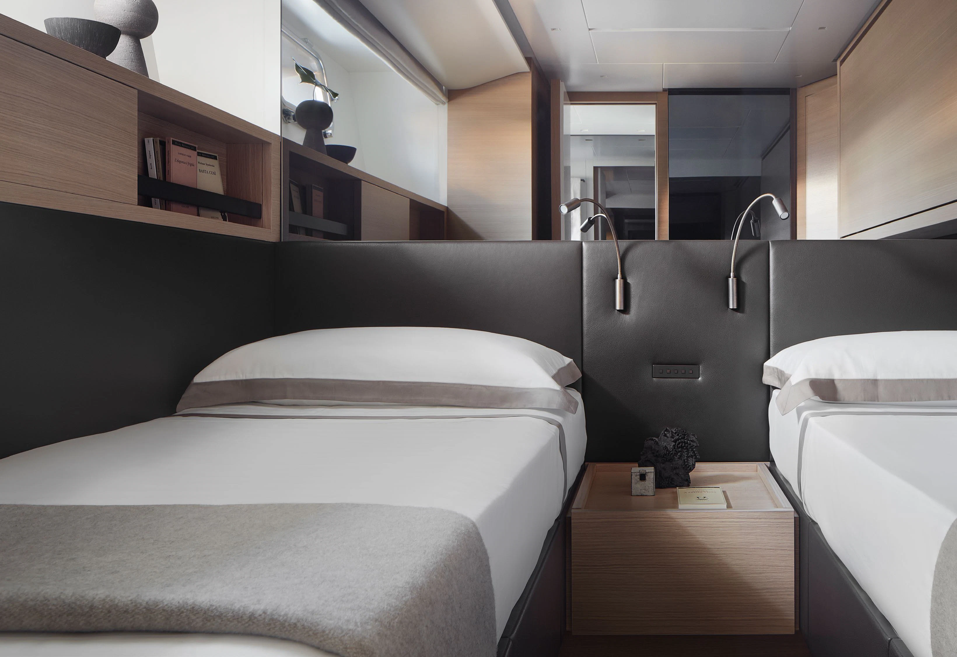 a room with two beds aboard STRA DODO Yacht for Sale