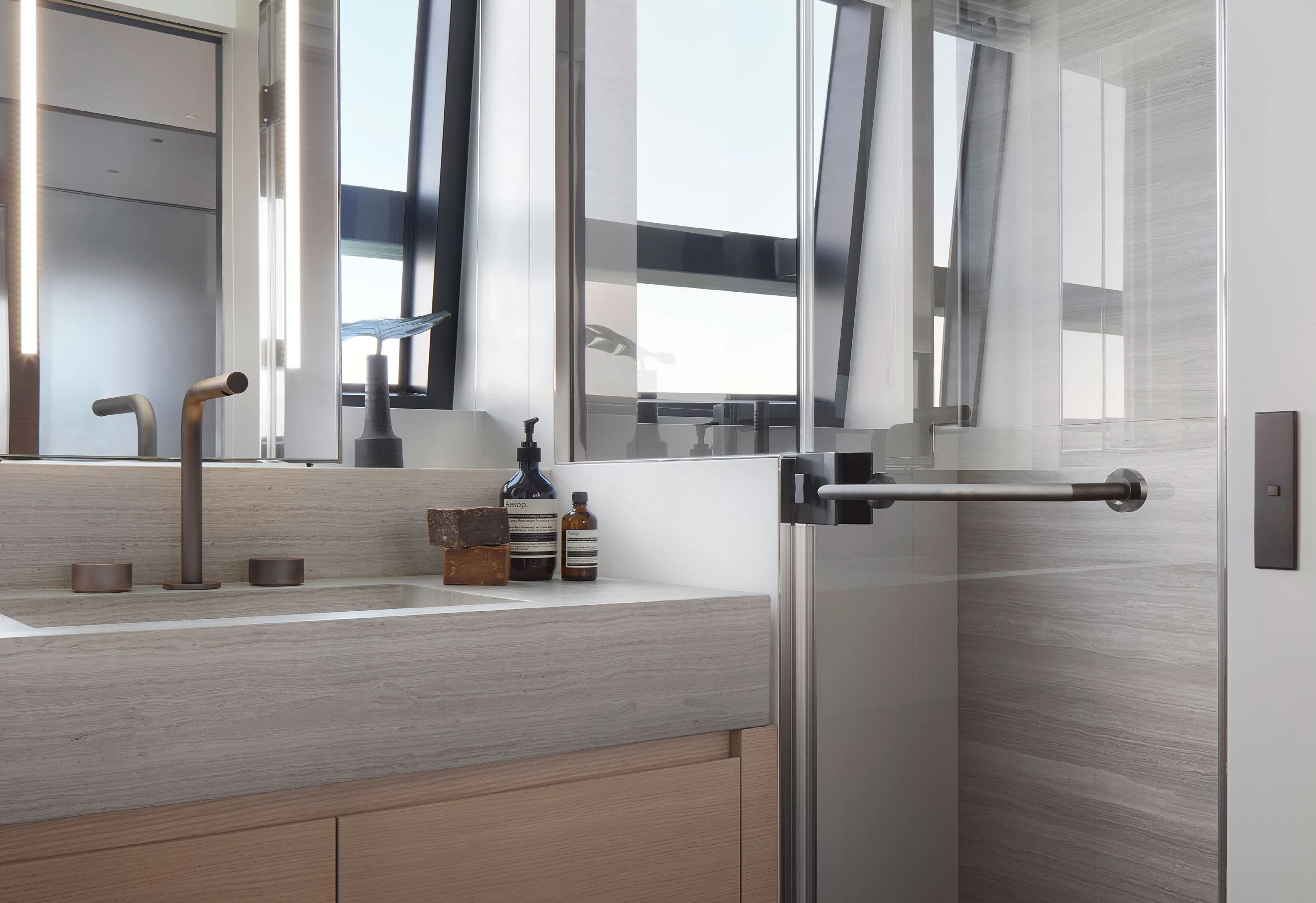 a bathroom with a countertop sink and a mirror aboard STRA DODO Yacht for Sale