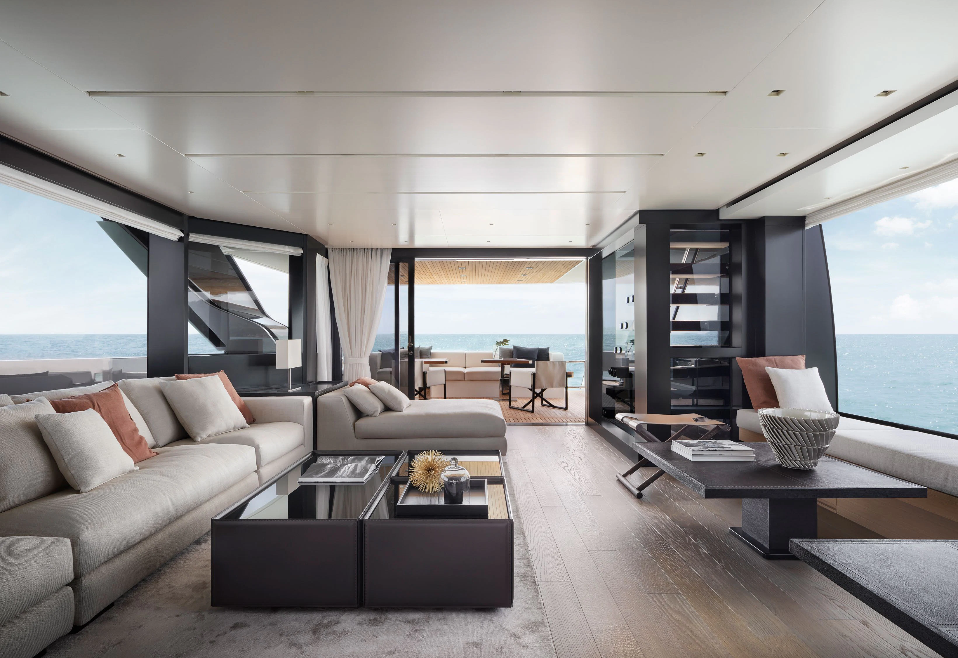a living room with a large window aboard STRA DODO Yacht for Sale