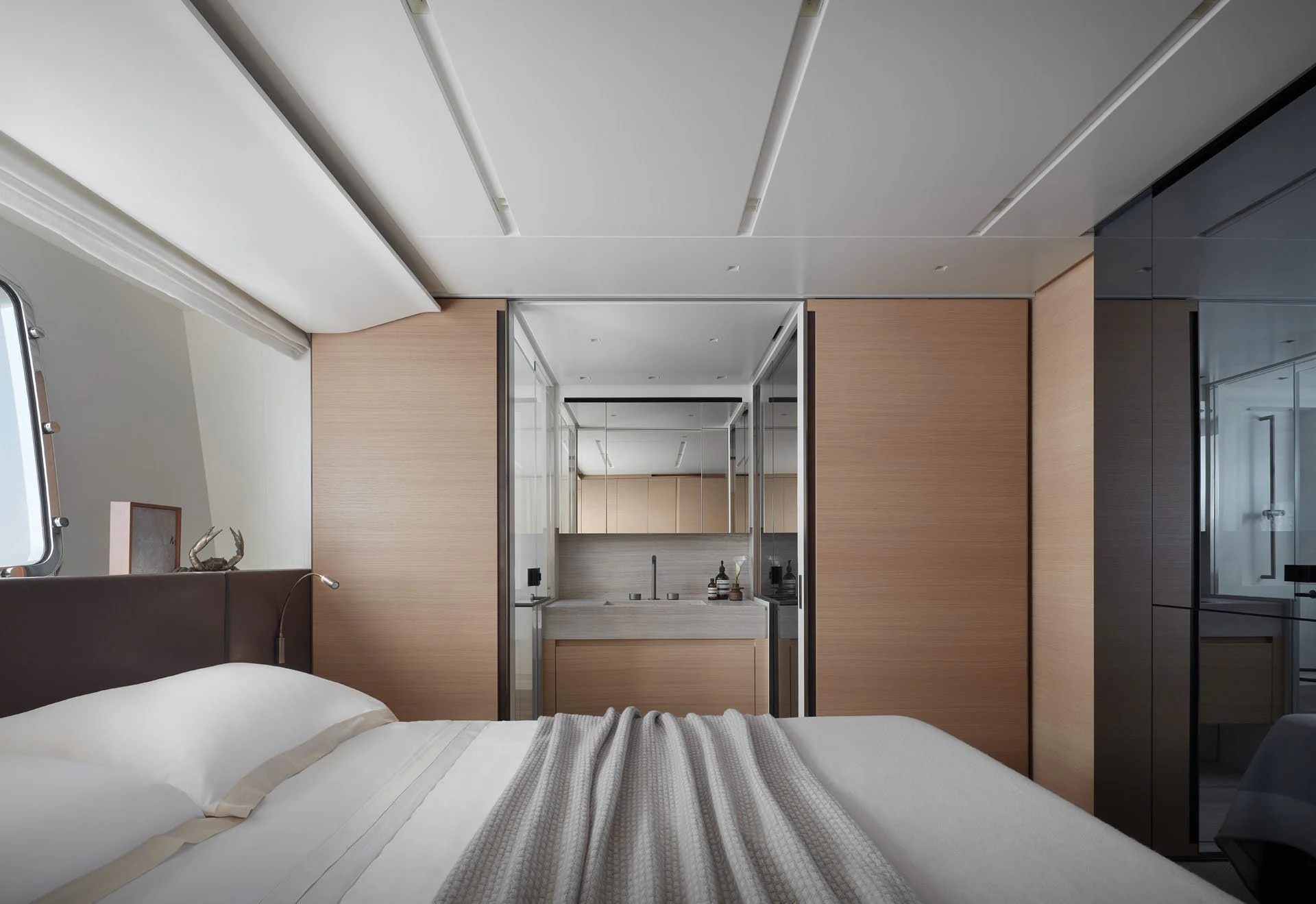 a room with a bed and a sink aboard STRA DODO Yacht for Sale