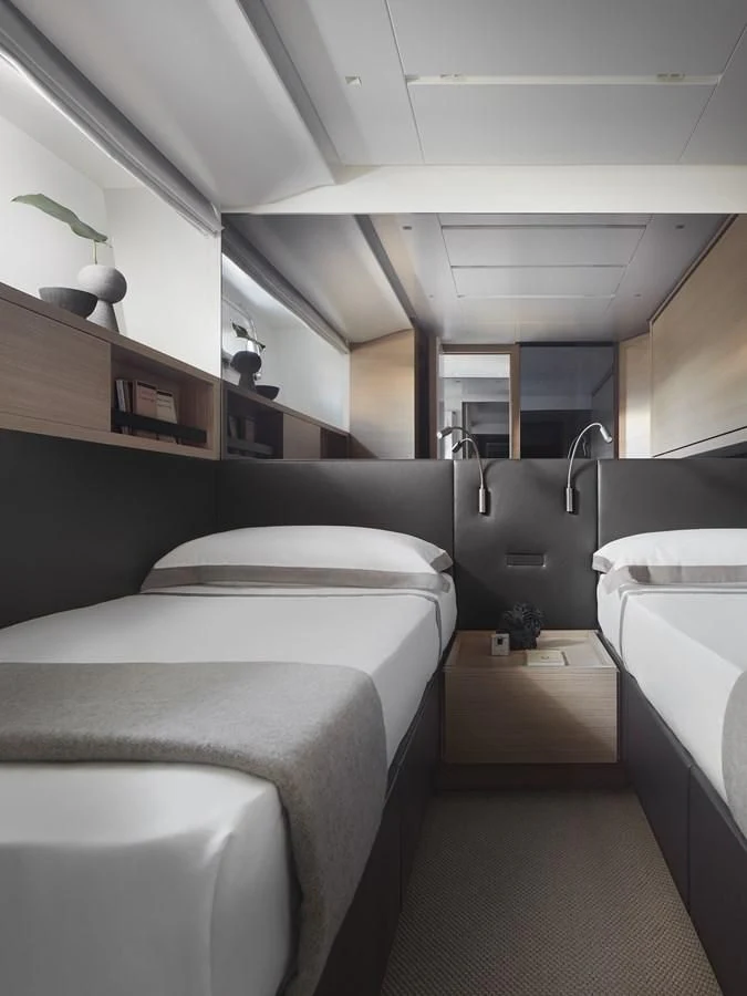 a room with a row of seats aboard STRA DODO Yacht for Sale