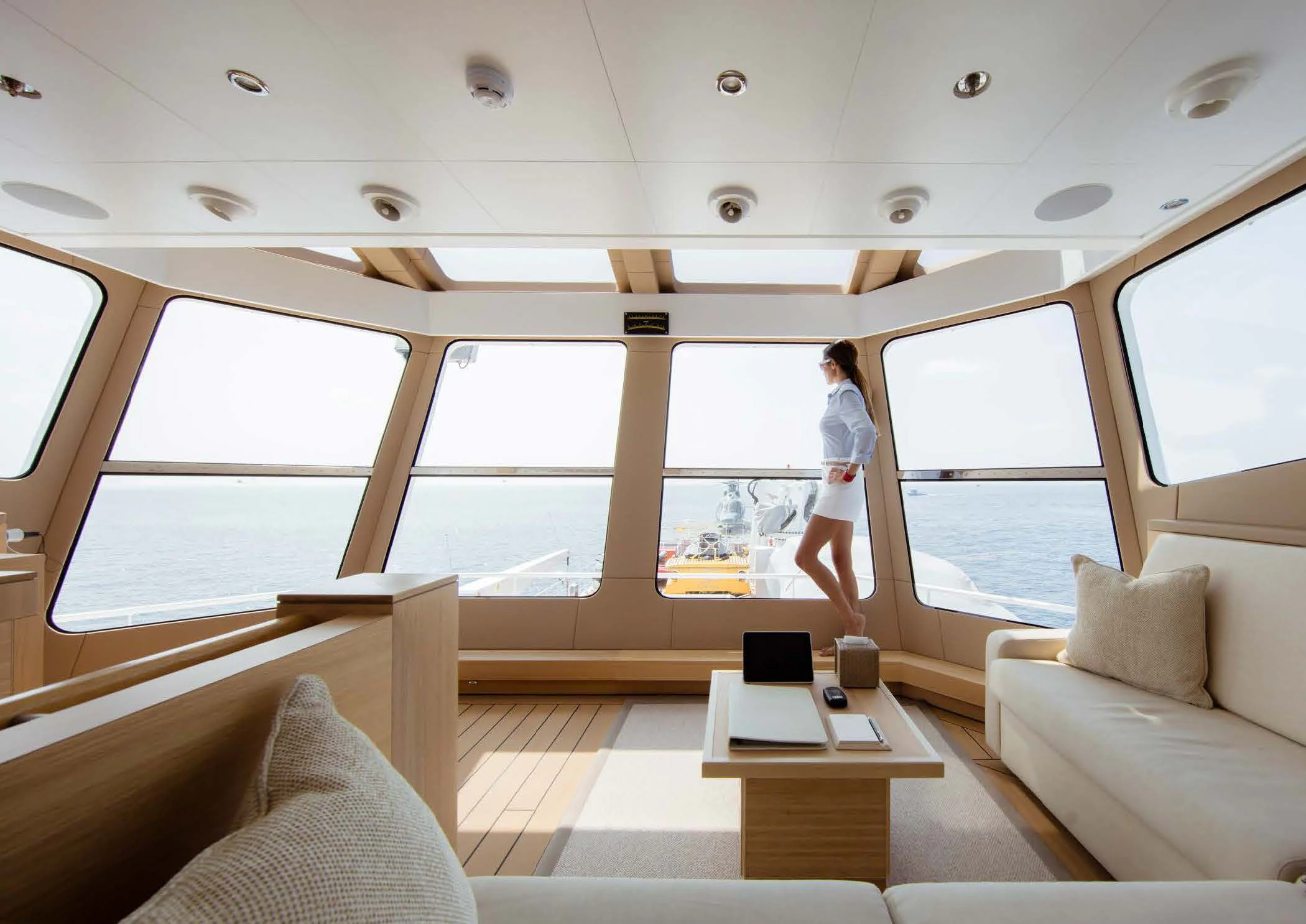 a person walking on a boat aboard KALM Yacht for Sale