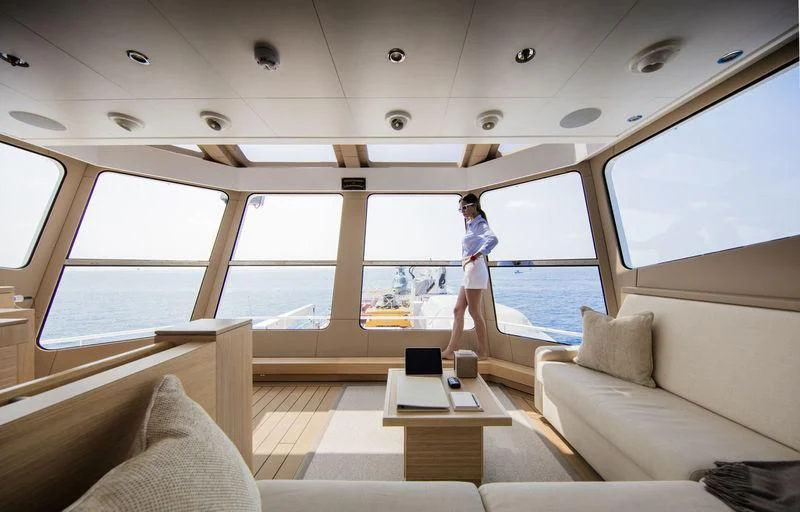 a person standing on a boat aboard KALM Yacht for Sale