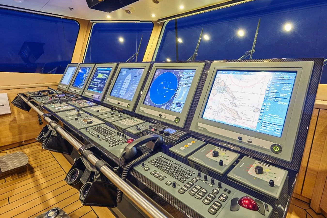 a room full of computers aboard KALM Yacht for Sale