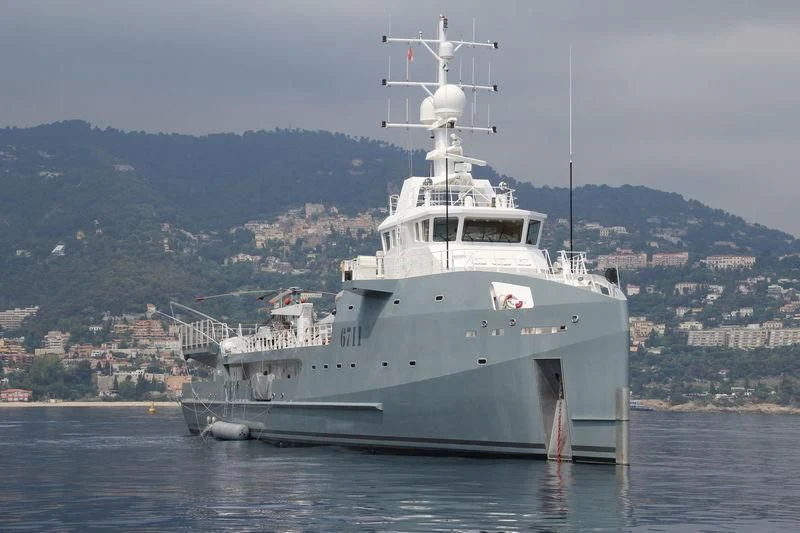 a large white ship in the water aboard KALM Yacht for Sale