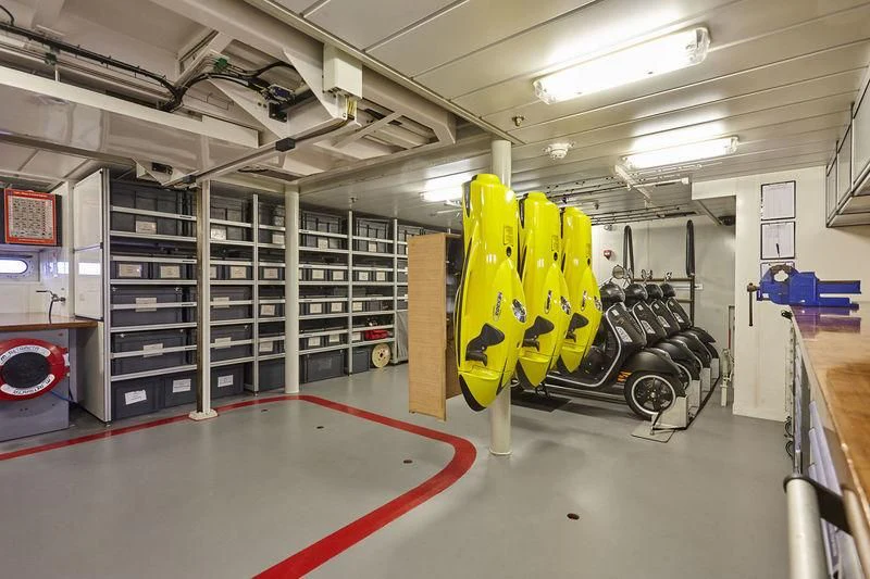 a room with many tires aboard KALM Yacht for Sale