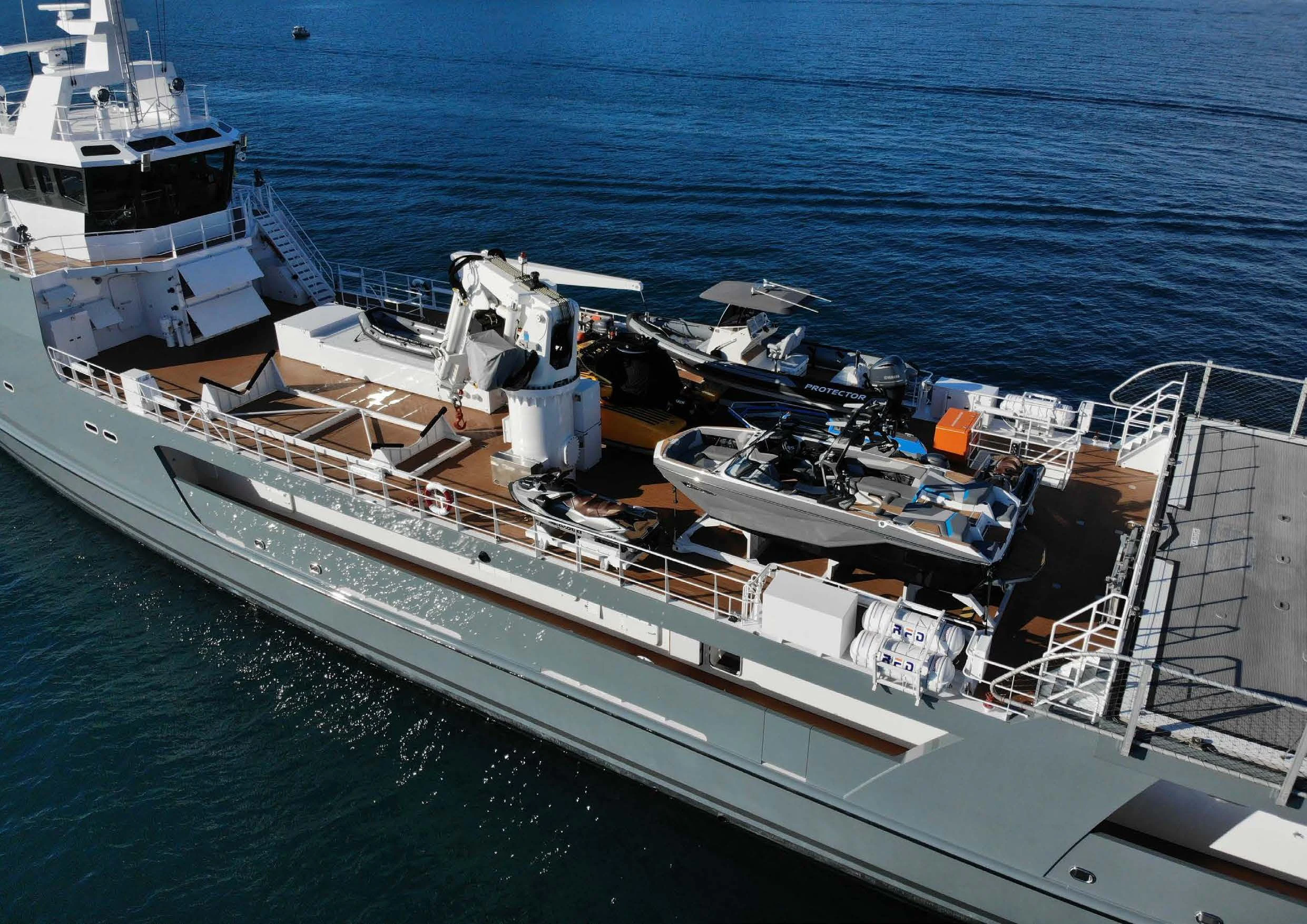 a large ship in the water aboard KALM Yacht for Sale