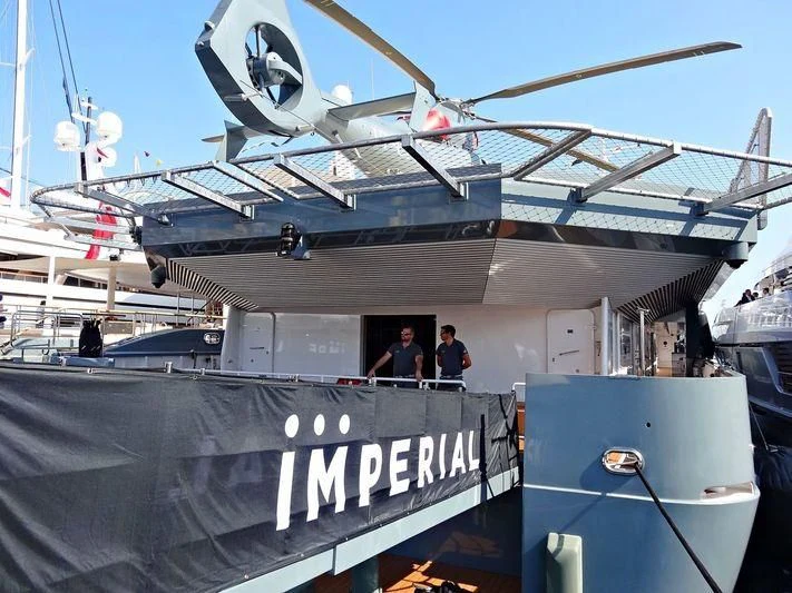 a boat with a large satellite dish aboard KALM Yacht for Sale