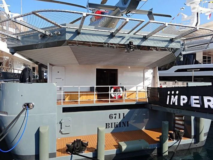 a large white building with a ladder aboard KALM Yacht for Sale