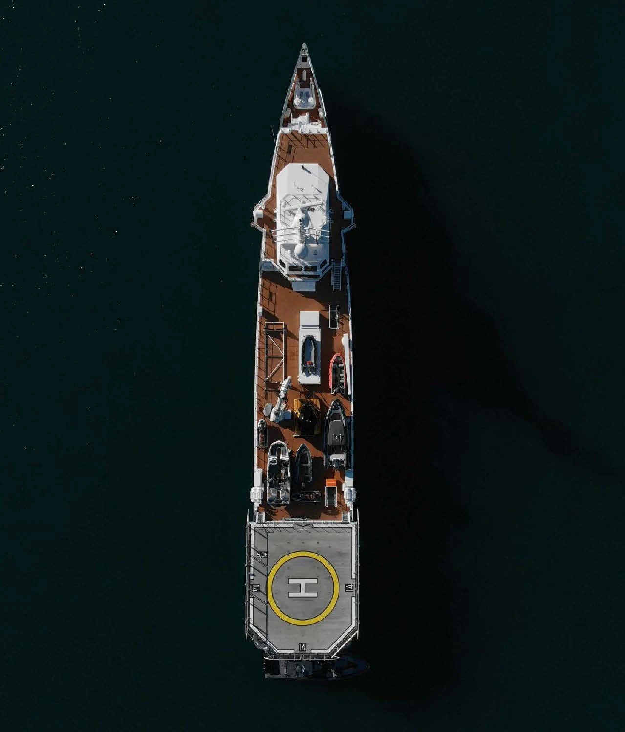 a tall tower with many bottles on it aboard KALM Yacht for Sale