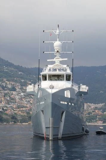 a large ship in the water aboard KALM Yacht for Sale