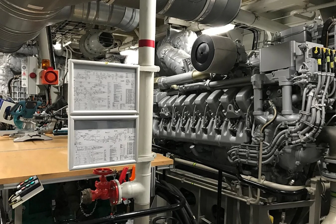 a room with machinery aboard KALM Yacht for Sale