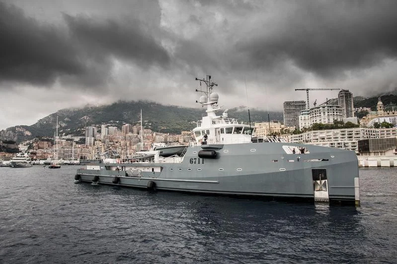 a large ship in the water aboard KALM Yacht for Sale