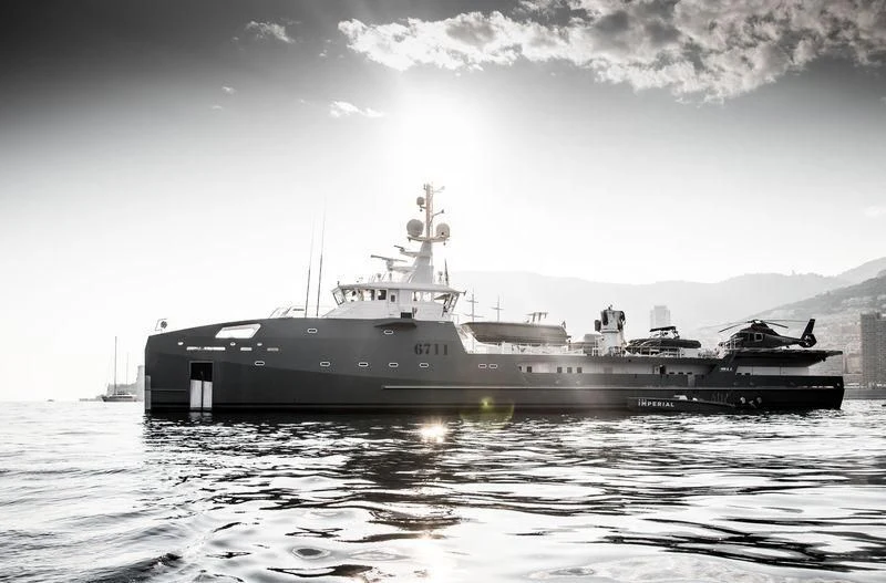 a large ship in the water aboard KALM Yacht for Sale