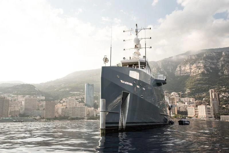 a large ship in the water aboard KALM Yacht for Sale