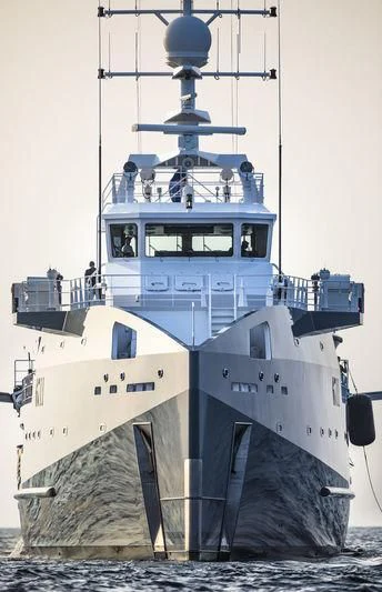 a large ship in the water aboard KALM Yacht for Sale