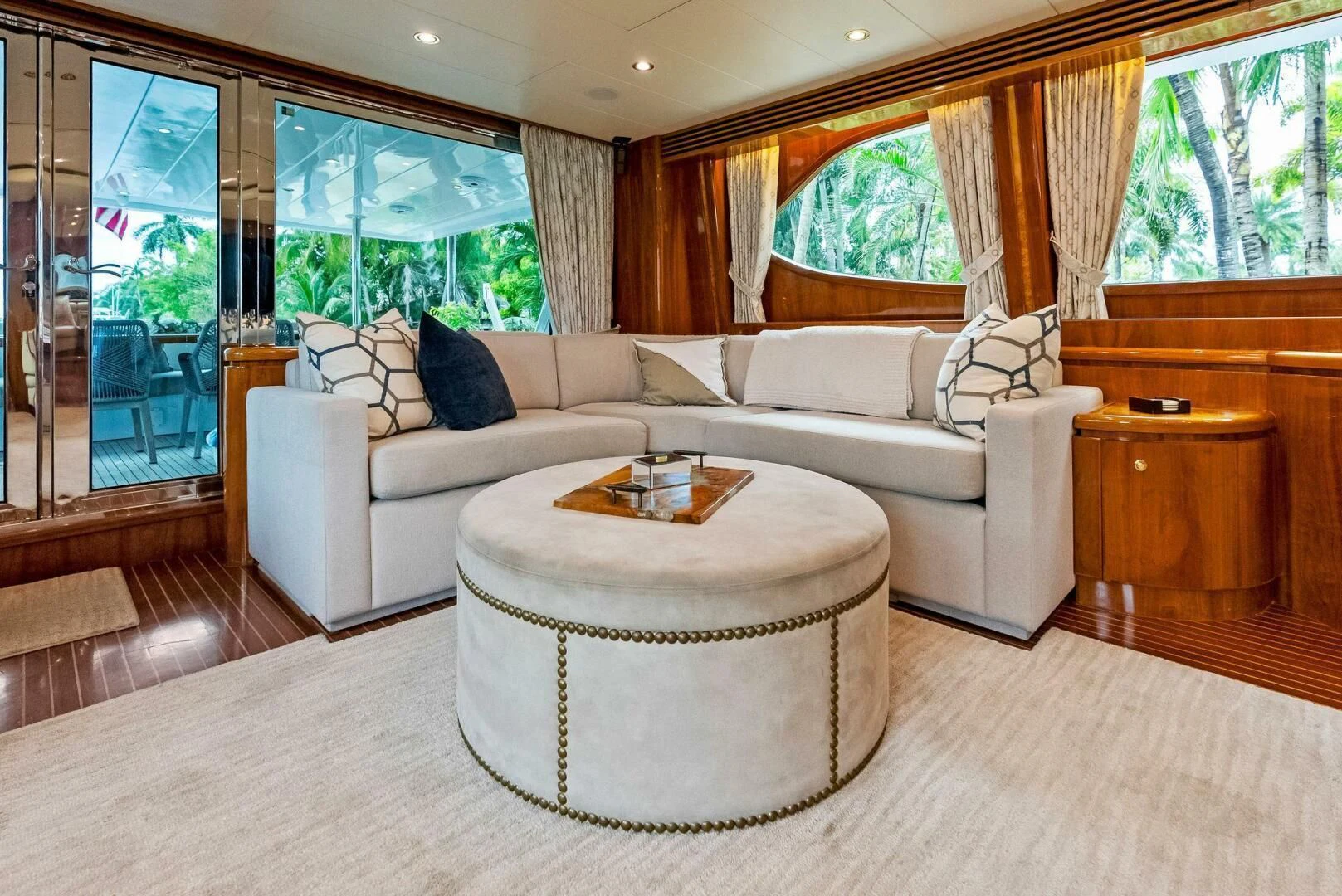 a living room with a couch and a table aboard TORTUGA Yacht for Sale